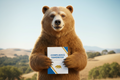 Compliance handbook with california bear holding it